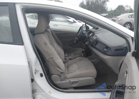 2010 Honda Insight Ex z USA, uszkodzony, nr VIN JHMZE2H7XAS007399